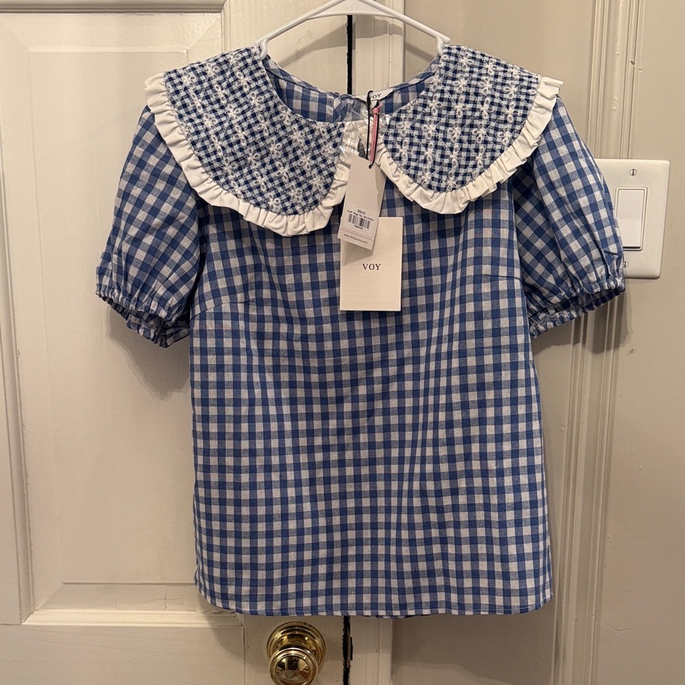 Blue gingham ladies Shirt NWT retails for 68. Size small, brand is Voy